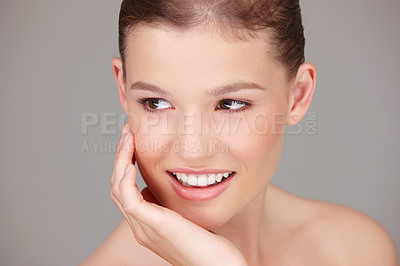 Buy stock photo Skincare, beauty and woman thinking in studio for dermatology, wellness or facial treatment with gray background. Cosmetology, smile and female model for healthy skin, luxury salon or natural glow