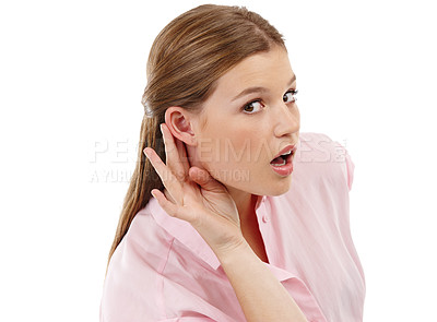 Buy stock photo Listening, secret and girl with gossip in portrait or studio on white background cupping ear for hearing. Spy, happy and curious woman with hand gesture for eavesdropping, news and privacy rumor