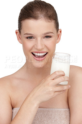 Buy stock photo Portrait, female person and healthy diet by drinking milk in studio for calcium, nutrition and protein with detox benefits. Happy, woman and dairy product smoothie with natural vitamins for wellness