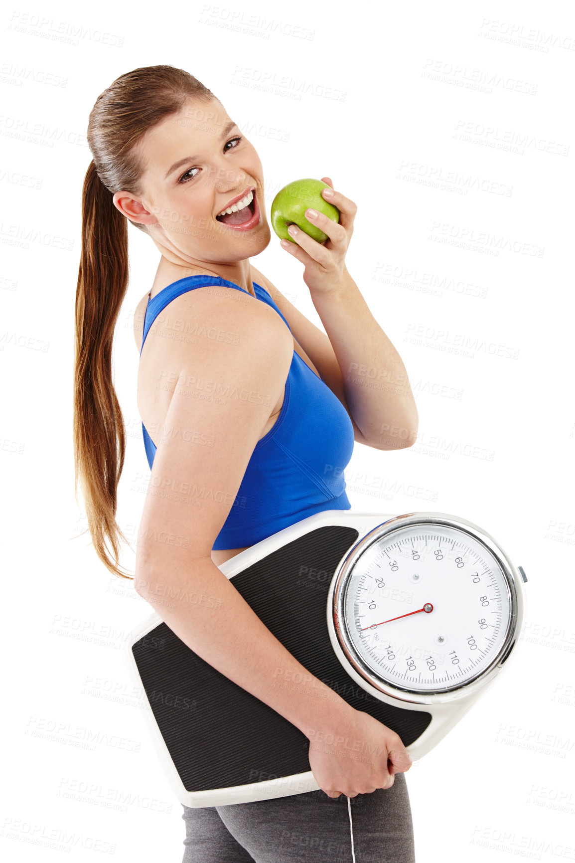 Buy stock photo Portrait of woman, apple and scale in studio for measurement, smile and excited for results of diet. Female person, body and care for calories target, weight loss and nutrition in white background