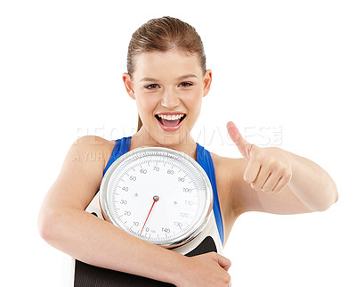 Buy stock photo Portrait of woman, thumbs up and scale in studio for measurement, smile and excited for results of diet. Female person, body and care for calories target or goals, weight loss and white background