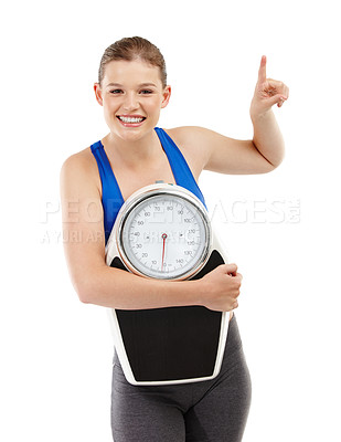 Buy stock photo Portrait, woman and scale pointing up in studio background for measurement, smile and excited for results of diet. Female person, body and care for calories target or goals, weight loss and mockup