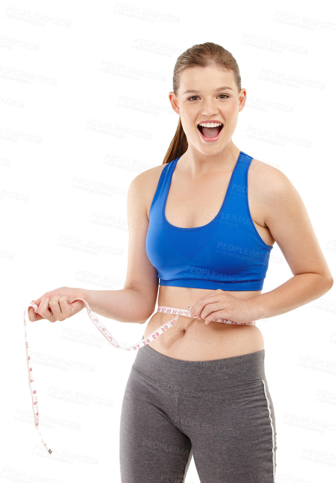 Buy stock photo A pretty teenage girl measuring her waistline and looking happy