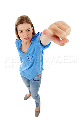 Buy stock photo Portrait, top view and woman pointing to space, angry and girl on white studio background. Face, female or teenager with gesture for blame, upset and nagging with problems, frustrated and bossy