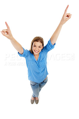 Buy stock photo Pointing up, girl and smile in studio for portrait, cheer and excitement on white background. Young woman, happy and arms raised for positivity in high angle, yes and supportive for good energy