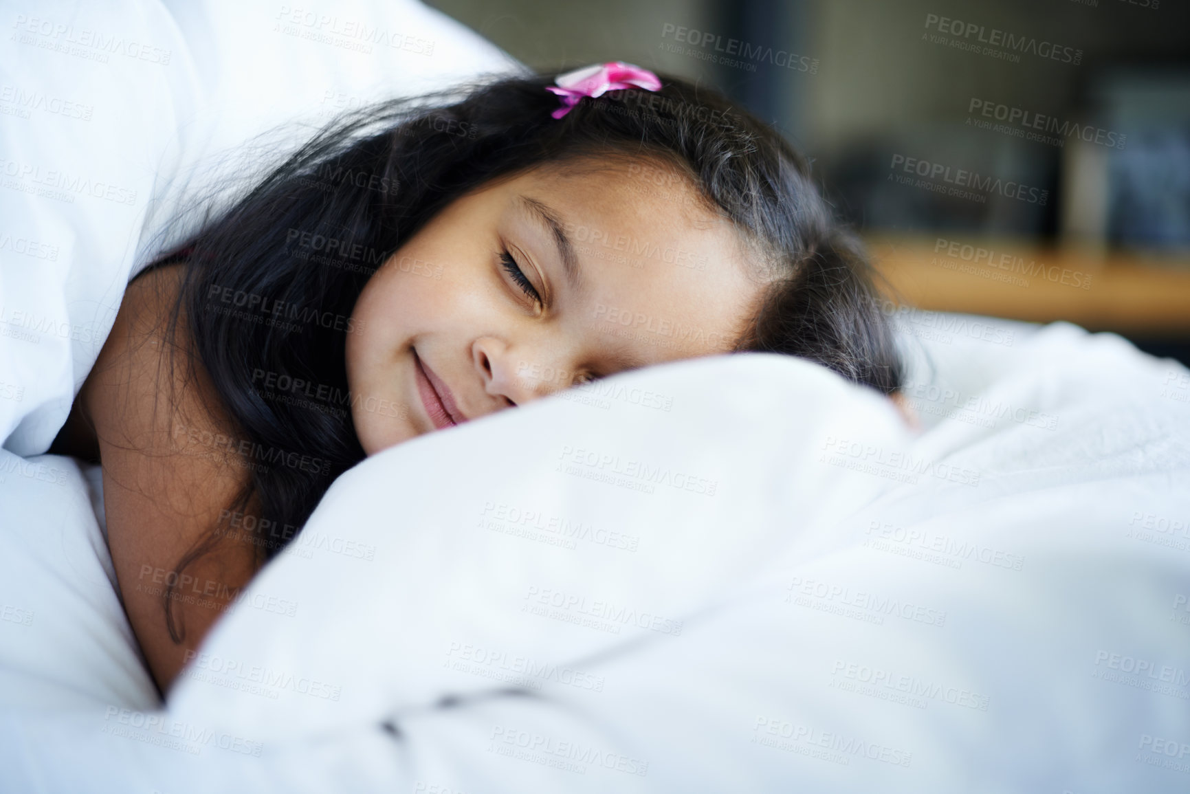 Buy stock photo Dream, face and sleep with girl in bed for nap, relax or rest in home on holiday and weekend. Child development, growth or youth and tired kid with blanket in bedroom of apartment for cozy comfort