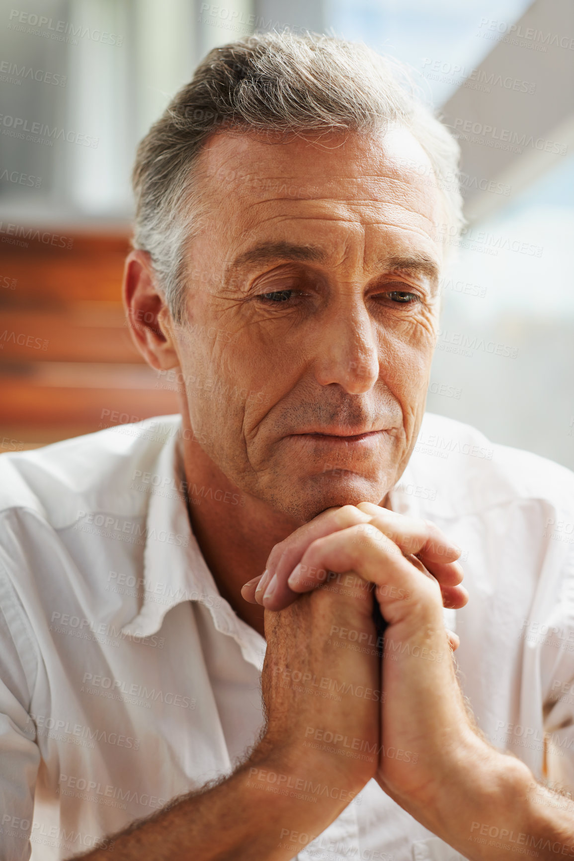 Buy stock photo Senior man, hands and thinking at home for decision, choice or idea on retirement and pension. Mature person, thought or wonder in house contemplating for memories, reflection or moment alone