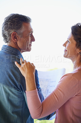 Buy stock photo Senior couple, blueprints and floor plan for new home, property investment or planning renovation in outdoor. Love, happy woman and elderly man with document for retirement, architecture or back view