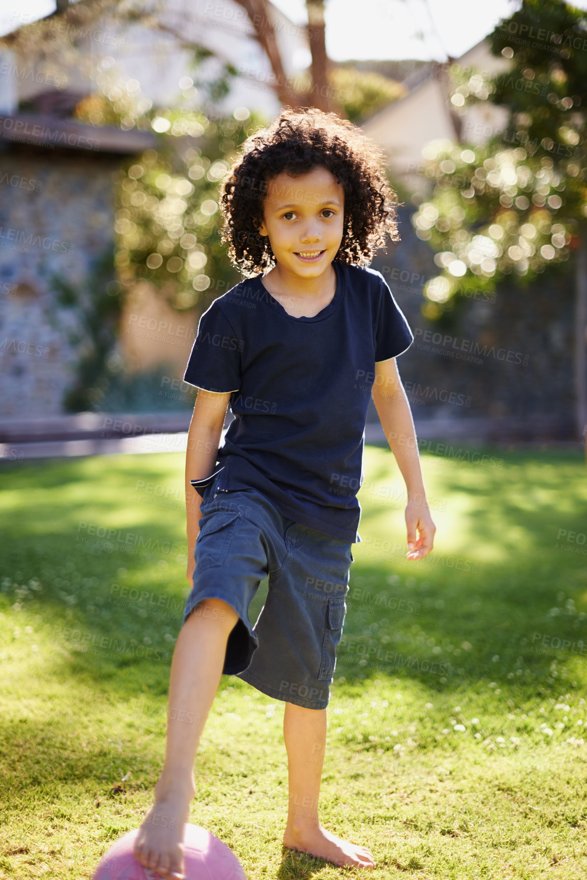 Buy stock photo Boy, smile and portrait in garden with ball for fun in nature for child development with happiness. Fitness, motor skills and cognitive in sunlight for vitamin d with healthy habit in America. 