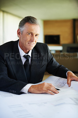 Buy stock photo Portrait, blueprint and mature man with planning, finance and check for tax of investment in property. Real estate, realtor and executive of business with smile and paperwork for budget on desk