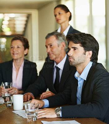 Buy stock photo Business people, meeting and listening in office together for communication, discussion or deal negotiation. Collaboration, colleagues or employees in workplace talking for plan, agenda and feedback