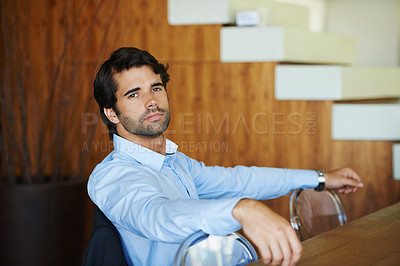 Buy stock photo Serious, business and man in office portrait for dedication in corporate career, determination and professionalism in workplace. Businessman, relax and human resources manager for company or job.