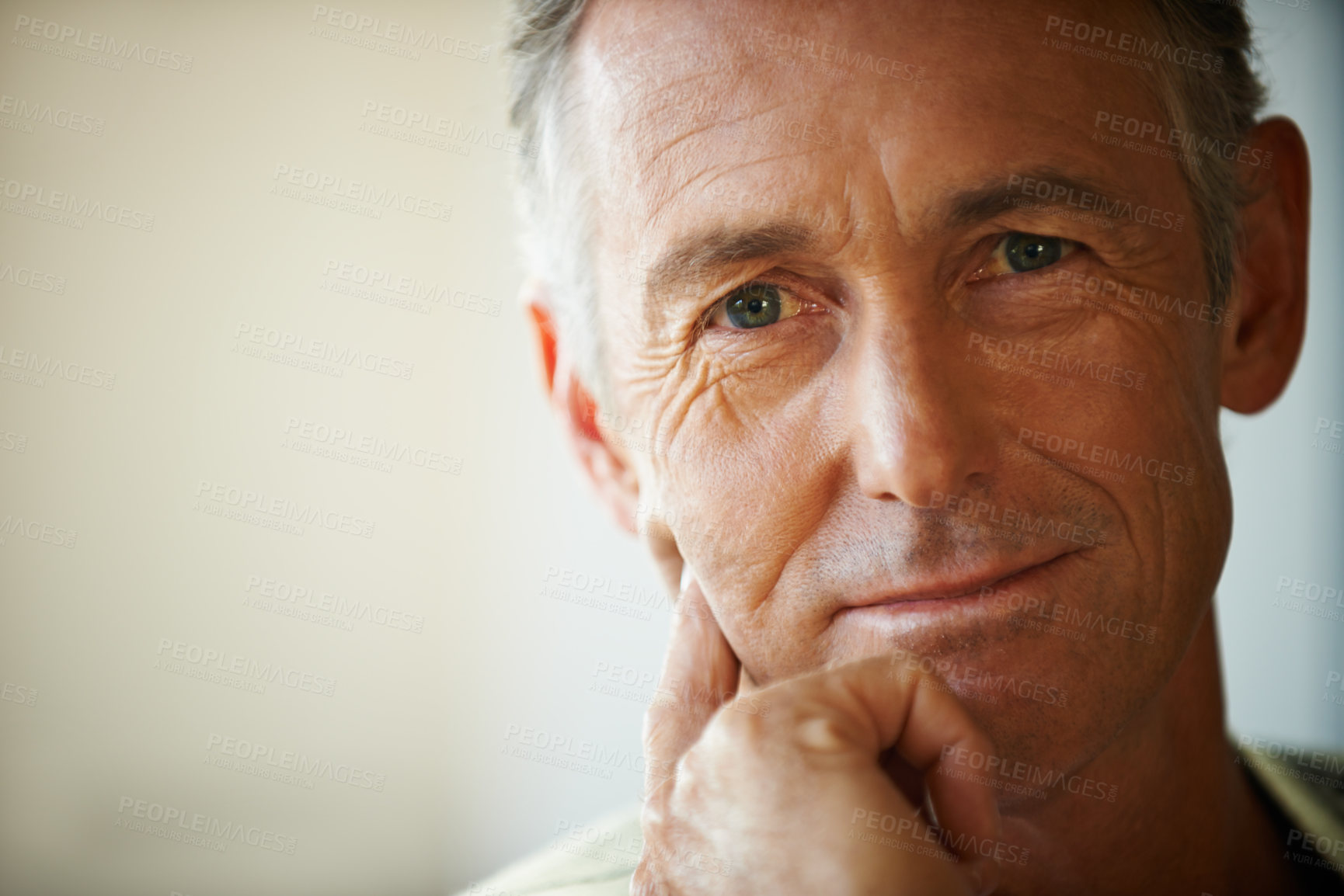 Buy stock photo Headshot, senior man and portrait thinking about retirement at home, apartment and living room with mockup space. Hand, idea and mature male person in house to relax in lounge for elderly care