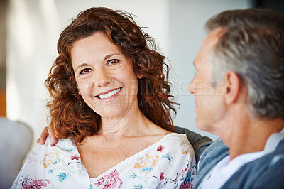 Buy stock photo Portrait, happy woman or mature couple in home living room for conversation or communication in marriage. Smile, pride or female person speaking to man in retirement or discussion to relax together 