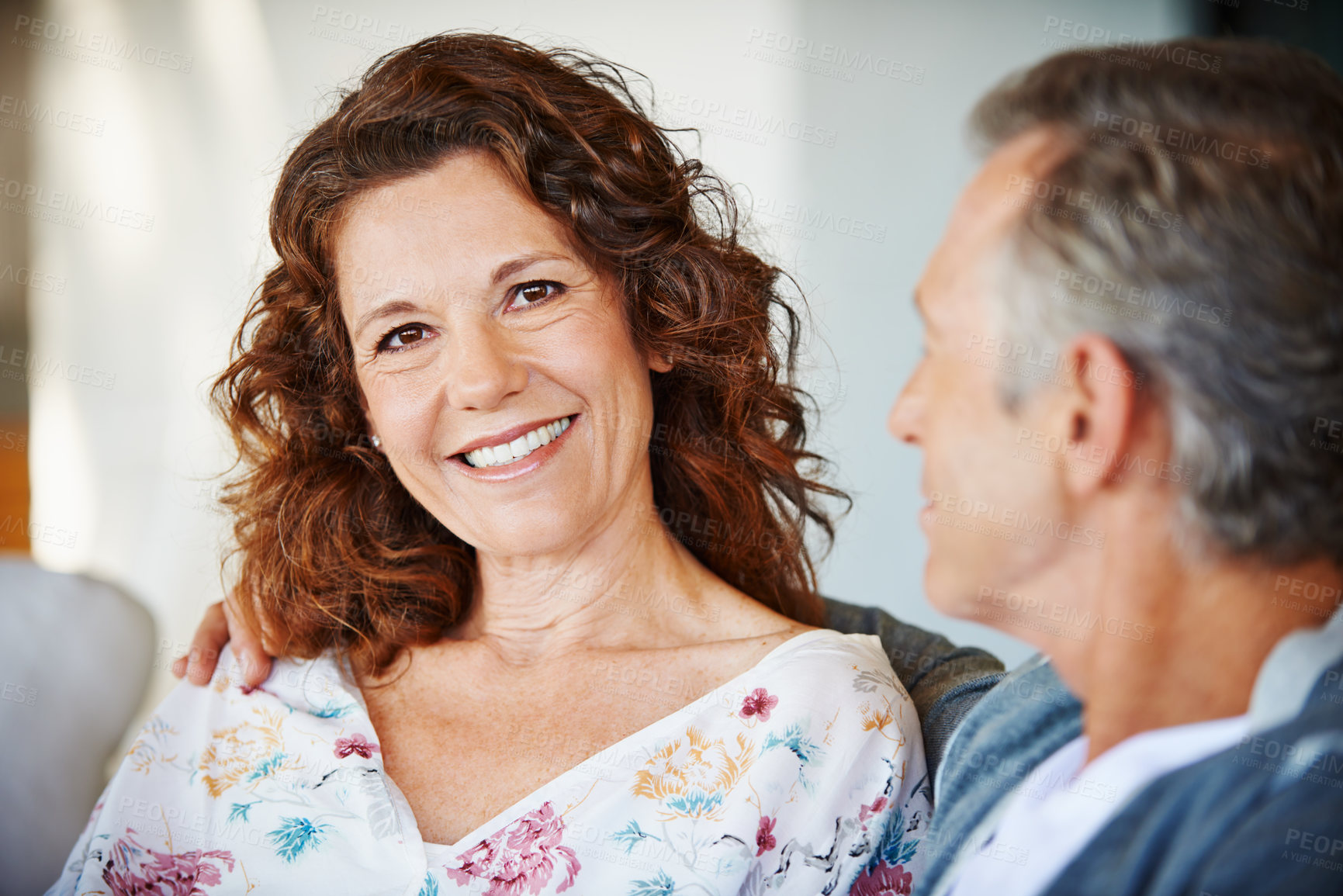 Buy stock photo Portrait, happy woman or mature couple in home living room for conversation or communication in marriage. Smile, pride or female person speaking to man in retirement or discussion to relax together 