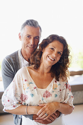 Buy stock photo Portrait, honeymoon or mature couple hug in home for support, wellness or love for care, marriage or trust. Smile, anniversary or happy woman bonding with man in retirement, break or house to relax