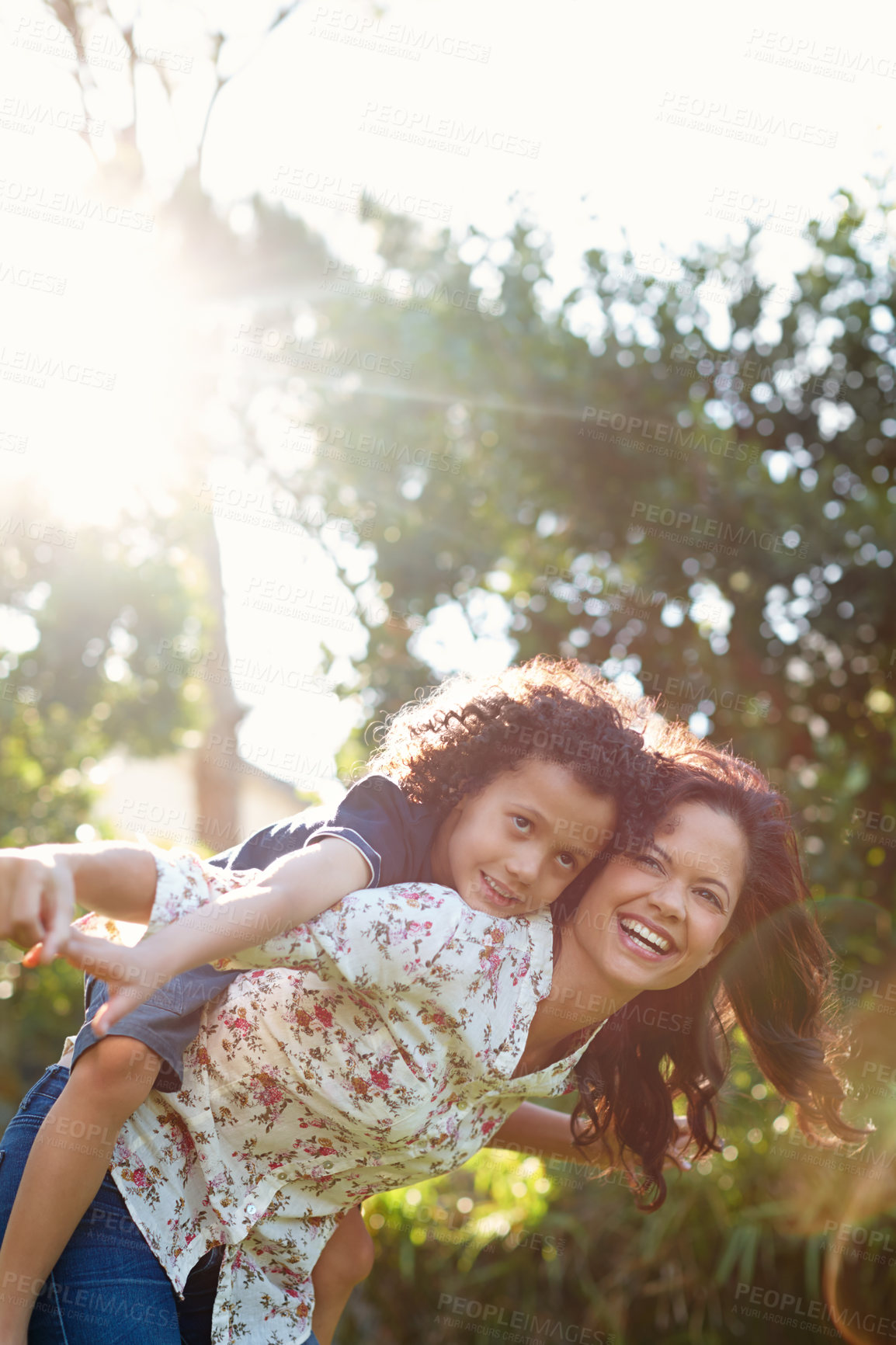 Buy stock photo Mother, son and laughing in park for fun in summer with child development in sunshine for happiness. Bonding, weekend and nature with lens flare, backyard and childhood with love or funny in Canada.