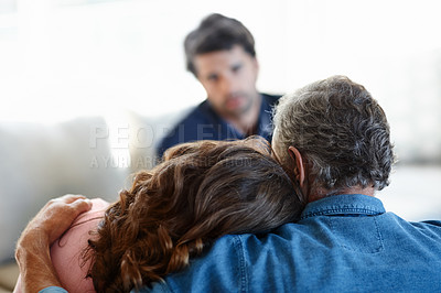 Buy stock photo Mature couple, sad and counseling in therapy for marriage, relationship and loss or depression. Elderly partners, therapist and advice by office for mental health, divorce and problems or stress