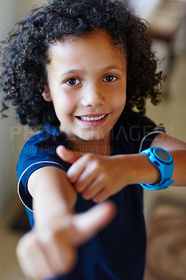 Buy stock photo Little girl smiling and showing thumbs up