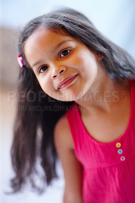 Buy stock photo Cute little girl smiling at the camera