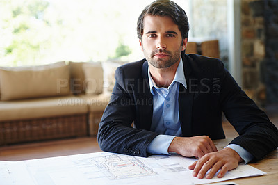 Buy stock photo Portrait of a draughtsman with his building plans