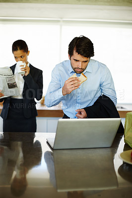 Buy stock photo Home, breakfast and businessman reading of laptop, bread and woman with newspaper for update of stock market. Surprise, employee and auditor with email of report, analytics and rush for project