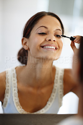 Buy stock photo Home, mirror and woman with mascara with makeup, beauty and application with cosmetics in bathroom. House, reflection and female person with product for eyelashes, brush and treatment for self care