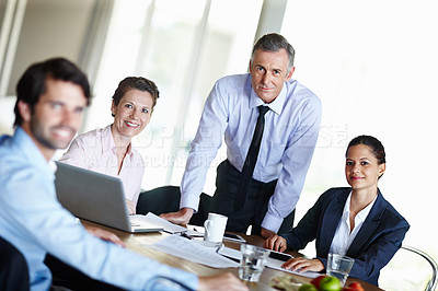 Buy stock photo Happy, business people or team with laptop in office for meeting, discussion and deal negotiation. Corporate, colleagues or employees smiling in boardroom together for contract, review and feedback