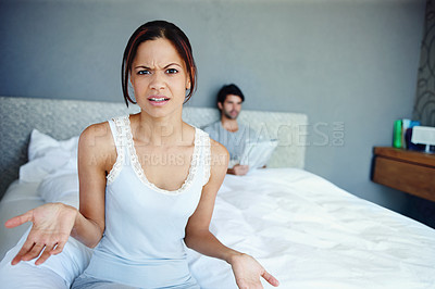 Buy stock photo Upset, couple and portrait of confused woman in bedroom for problem, fight or erectile dysfunction, Newspaper, bored and female person with husband for frustrated, disappointed or argument in home