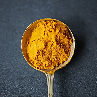 Buy stock photo Cropped shot of spice in a spoon