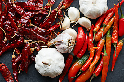 Buy stock photo Top view of spices, chilli and garlic with vegetables for food, ingredients on table and culinary flavor for nutrition. Seasoning, heat and organic produce on table, fresh for cuisine and catering