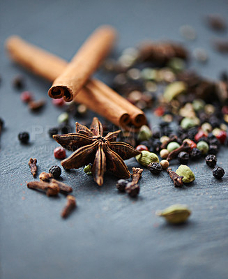 Buy stock photo Whole spices, mix of ingredients and cooking for food, fragrance and flavor with culinary background. Stick cinnamon, star anise and peppercorn for catering in closeup, seasoning collection and aroma