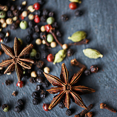 Buy stock photo Whole spices, mix of ingredients and closeup for food, fragrance and flavor with cooking. Collection, star anise and peppercorn with cardamom for catering, seasoning and aroma on culinary background