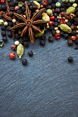 Buy stock photo Whole spices, ingredients and cooking for food with mock up, fragrance and flavor with culinary space. Cloves, star anise and peppercorn with cardamom collection for catering, seasoning and aroma