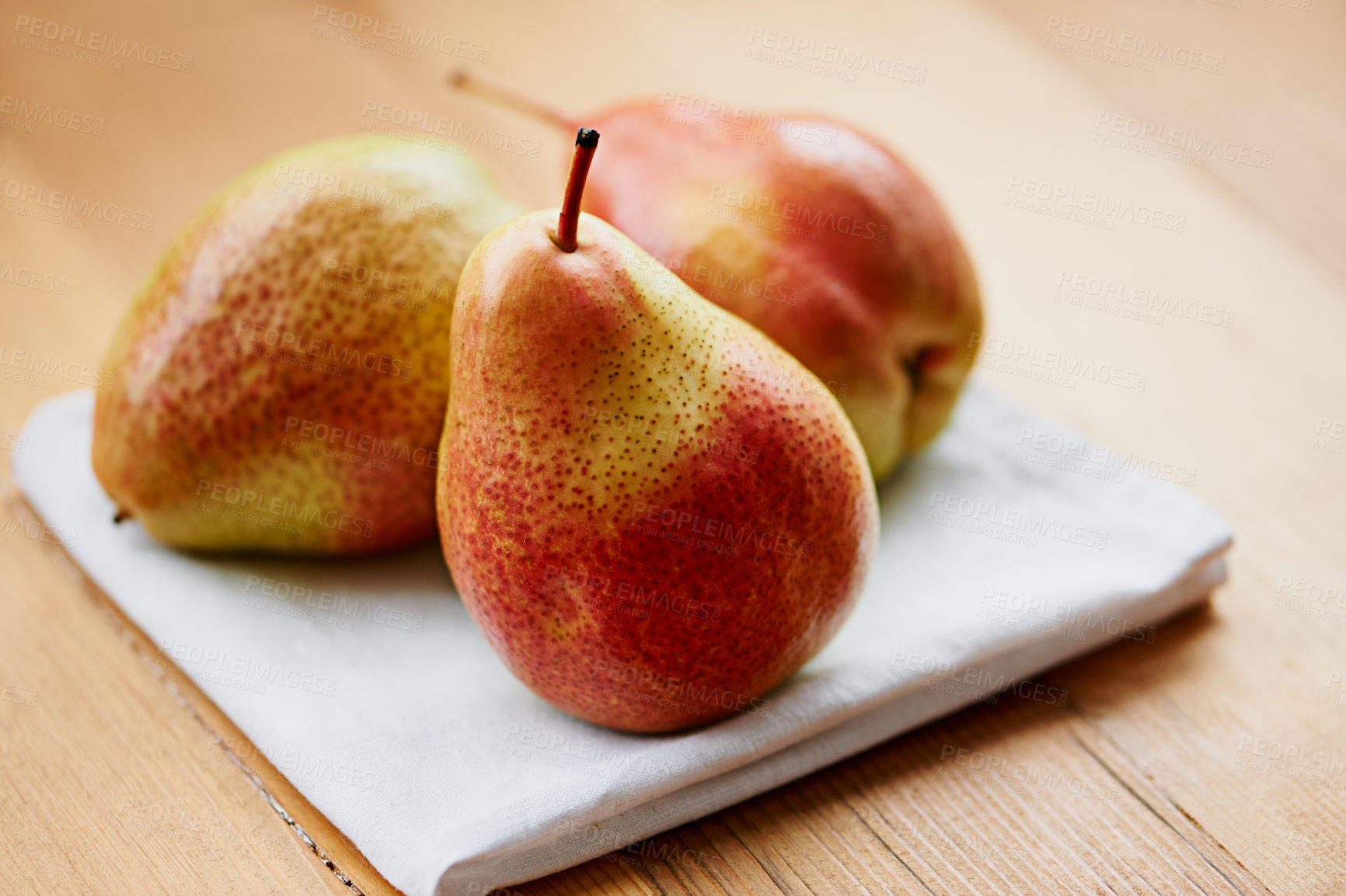 Buy stock photo Home, fruits or pears on table in kitchen for fiber, organic or balanced diet for meal nutrition or snacks. Background, healthy or closeup of natural ingredients for vitamins, fresh vegan or raw food