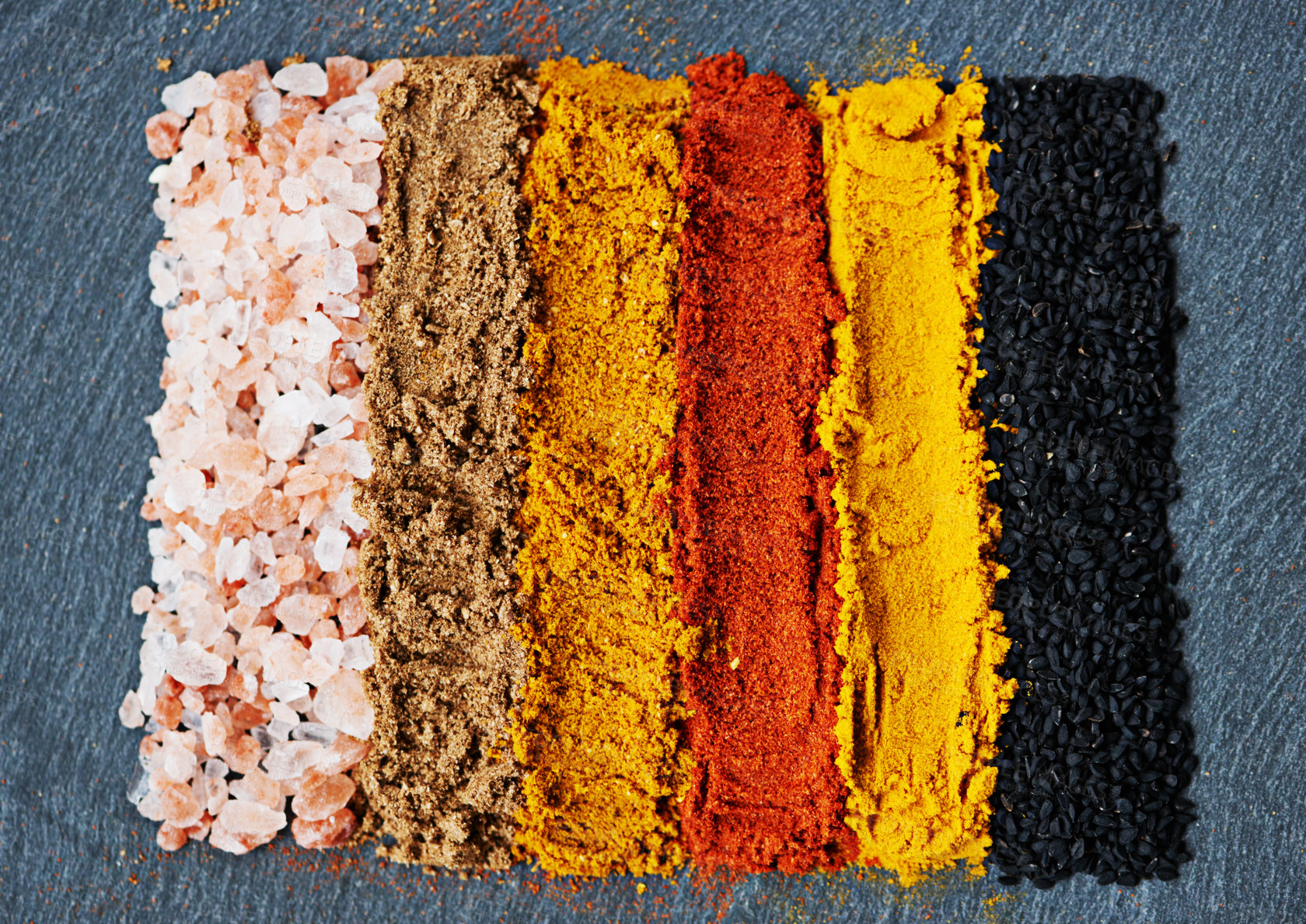 Buy stock photo Row, spice and selection of powder for flavor, turmeric and paprika for meal. Top view, condiments and options for spicy cooking in Indian culture, cumin and food preparation in closeup for aroma