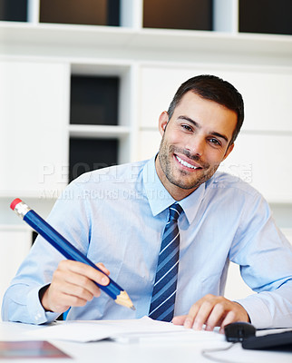 Buy stock photo Pencil, portrait and smile with business man at desk in office for planning, report or writing. Agenda, prop and schedule with happy employee in workplace to sign documents for administration