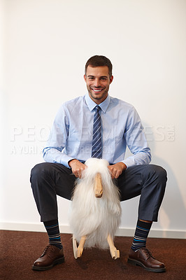 Buy stock photo Portrait, smile and businessman on rocking sheep for funny comedy in office in Germany. Happy, comic and goofy professional employee riding toy for silly joke, crazy or laughing broker in company