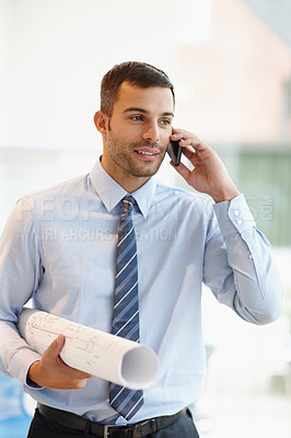 Buy stock photo Businessman, phone call and engineering architect with blueprint in corporate office for networking, approval or deal. Male person, cellphone and floor plan idea for building, renovation or contract