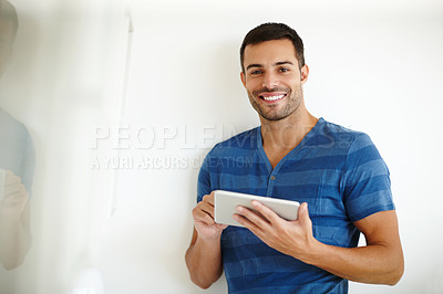 Buy stock photo Creative designer, tablet and smile portrait for project, planning and reading information or solution on website. Young man or business freelancer typing on digital technology for app startup