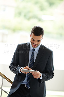 Buy stock photo Office, smile and businessman with tablet for news app, drafting email and internet connection for legal article. Male lawyer, tech and website research for online faq and update company social media