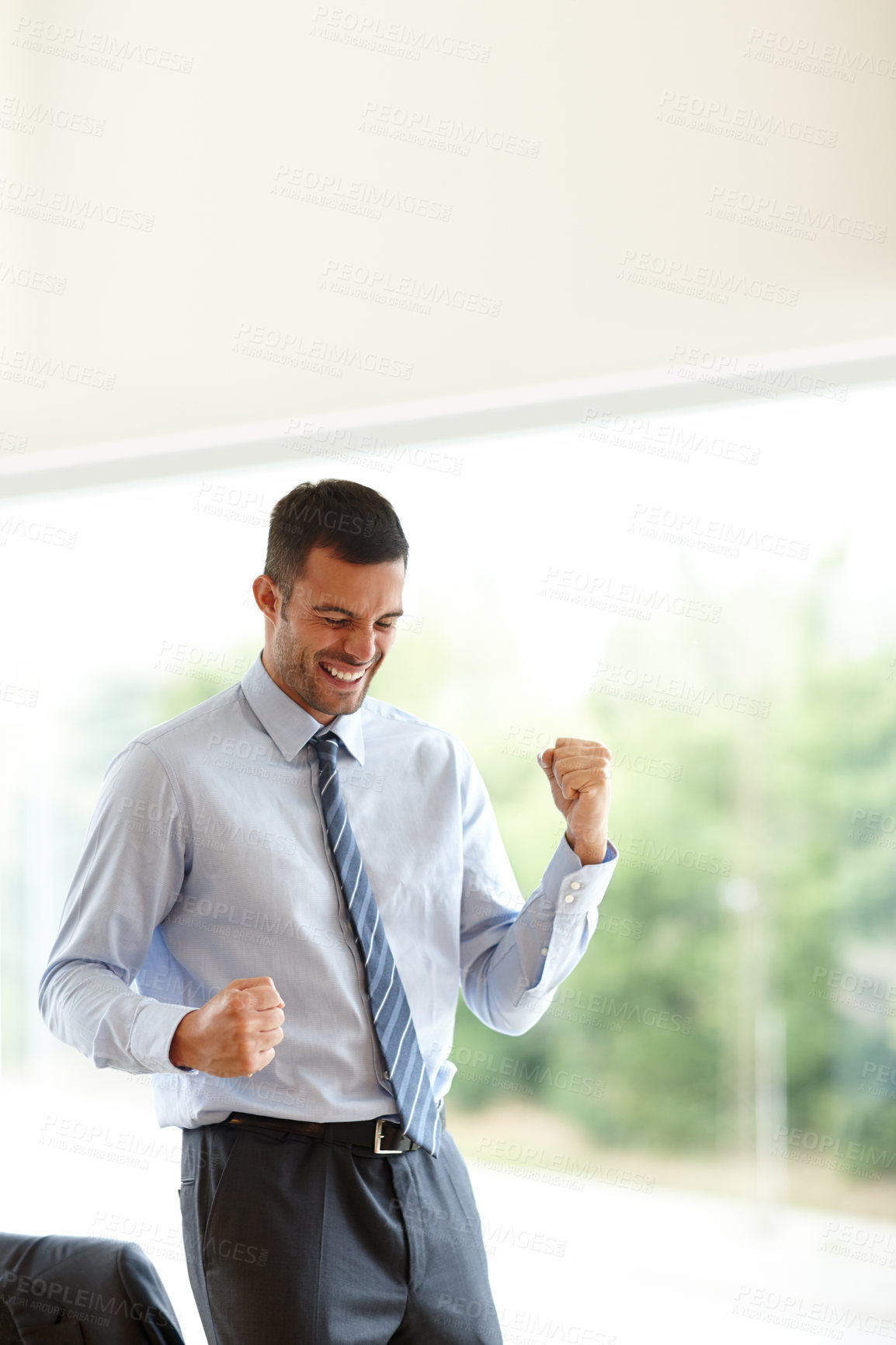 Buy stock photo Success, businessman and happy in workplace with achievement for weekend and break in agency. Accountant, celebrate and fist pump for winning, job promotion and bonus or opportunity for stock market 