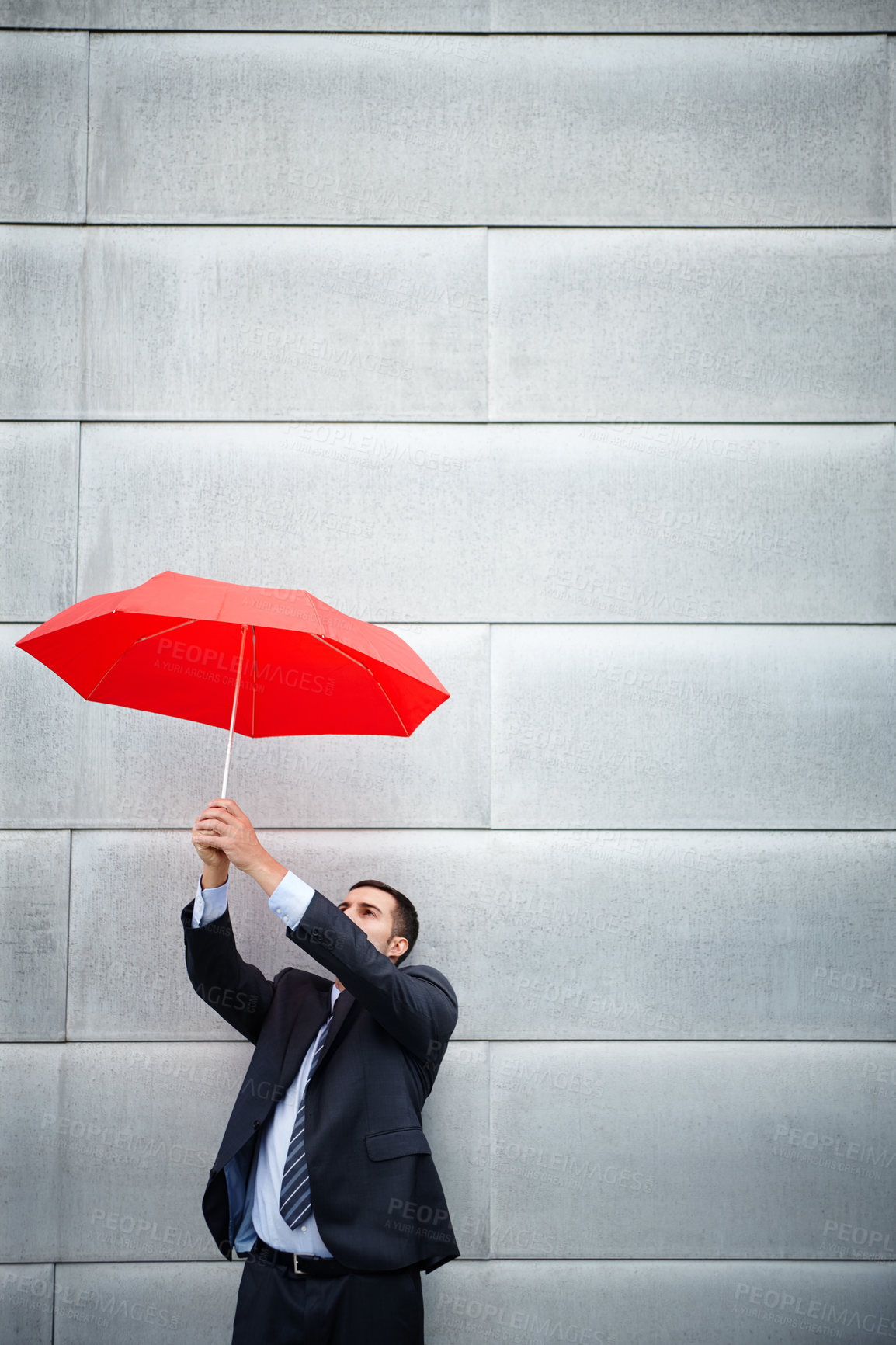 Buy stock photo Umbrella, businessman and insurance for coverage, protection and help for outdoors. Safety, security and financial rain cover for male person, raise and assest for future investment or opportunity