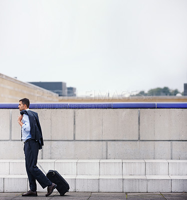 Buy stock photo Businessman, worry and walking with luggage for morning commute to work on urban sidewalk. Depressed, male person or employee and travel journey outdoor on city pavement with formal suit and suitcase