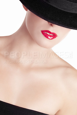 Buy stock photo Beauty shot of a young woman wearing a hat and red lipstick