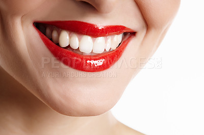 Buy stock photo Cropped closeup shot of a woman's lips with vibrant lipstick on