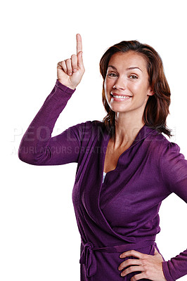 Buy stock photo Portrait, happy woman and pointing in studio with discount or promotion for fashion or product placement. Pride, female person and gesture for information by white background for advertisement 