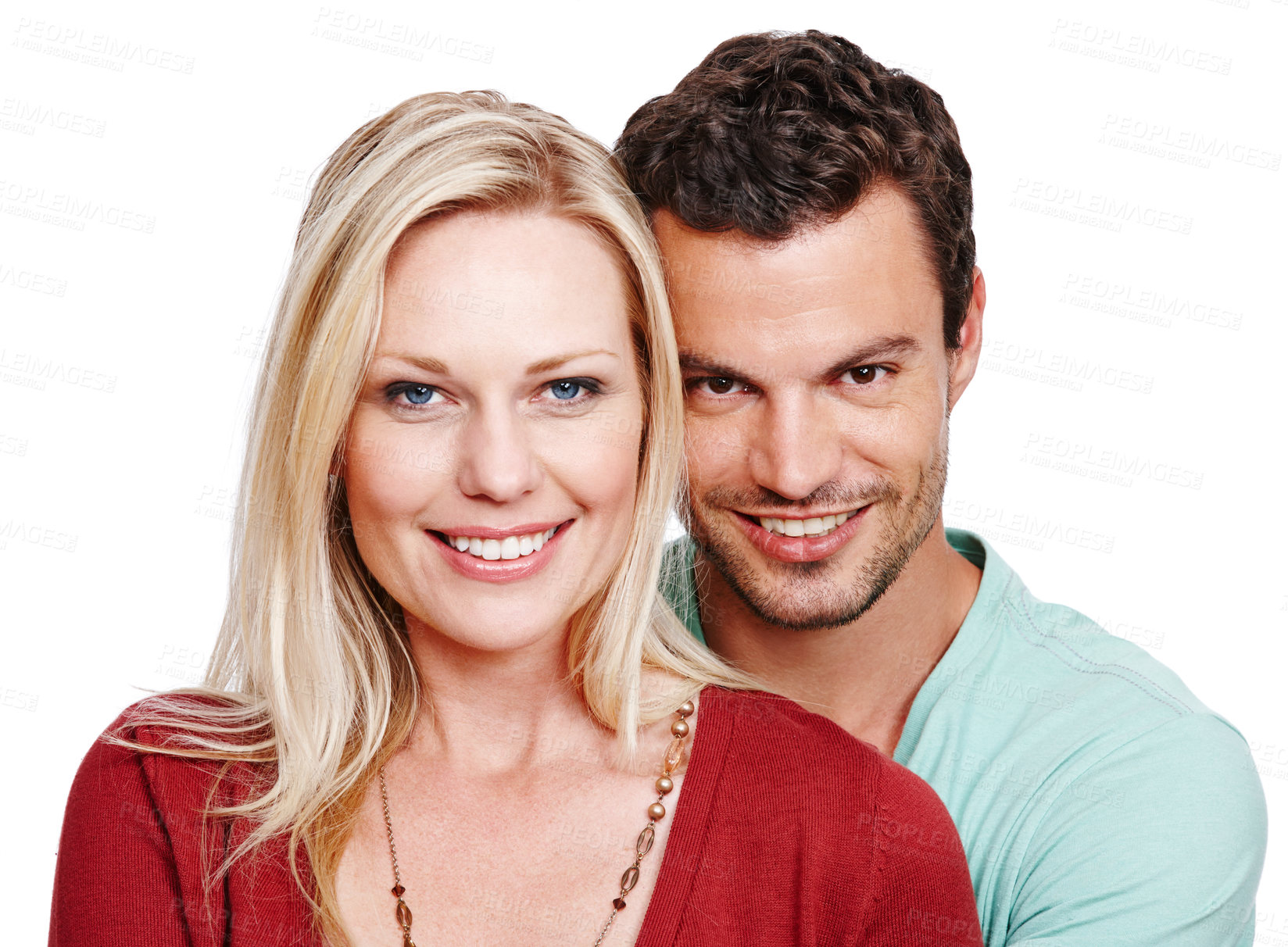 Buy stock photo An attractive couple smiling at the camera against a white background