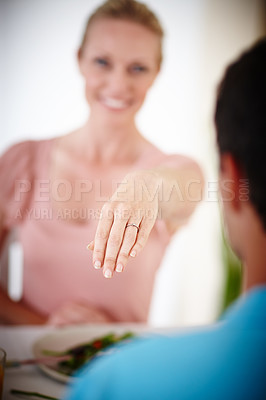 Buy stock photo Hand, engagement and woman ring with couple proposal, announcement and celebration. Dinner table, jewelry and diamond with smile, care and love together on a date with support and bonding from news