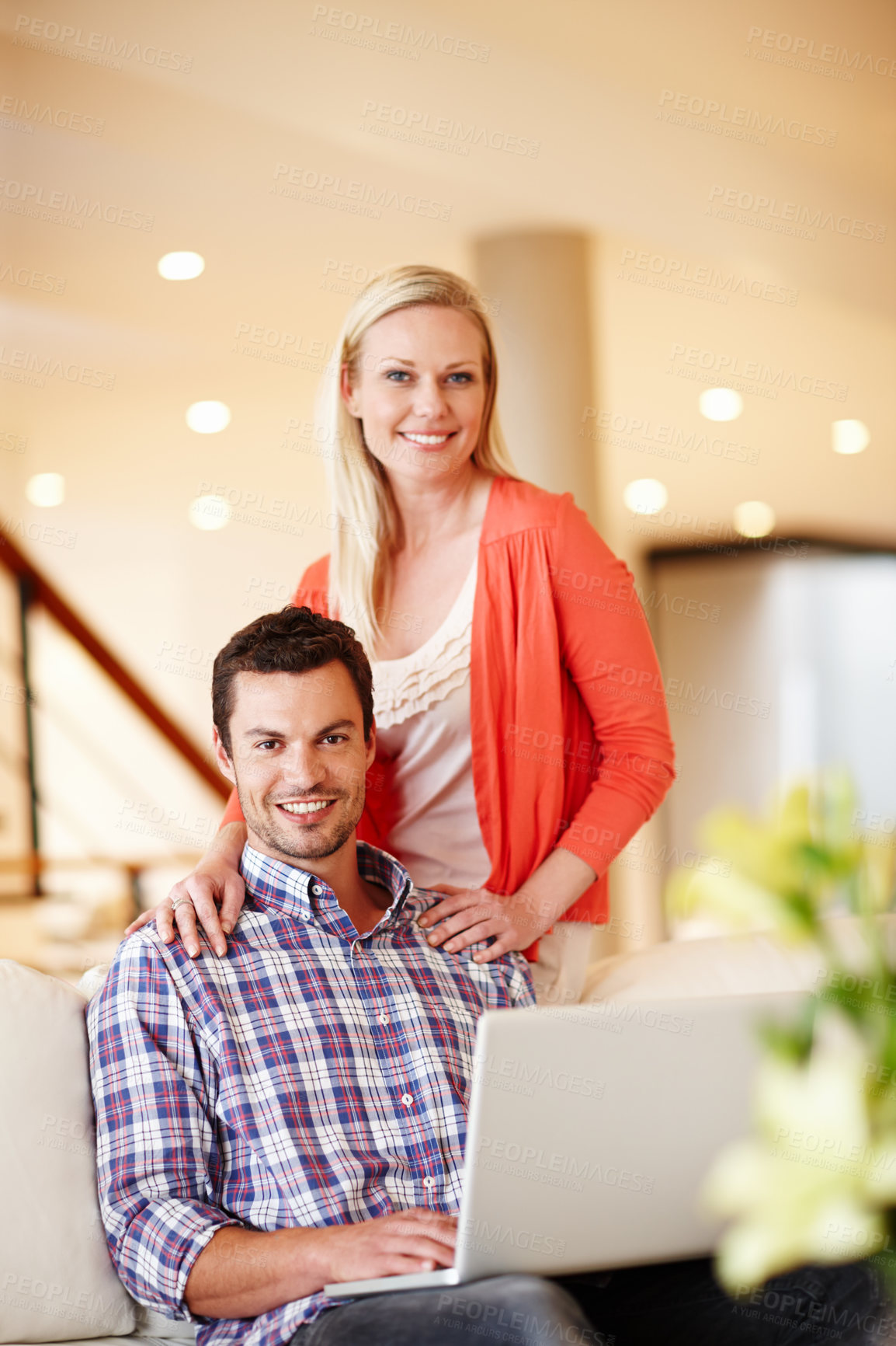 Buy stock photo Happy couple, portrait and home with laptop for online shopping, internet search and planning in luxury living room. Man and woman on sofa with computer or web for furniture catalog and decor choice